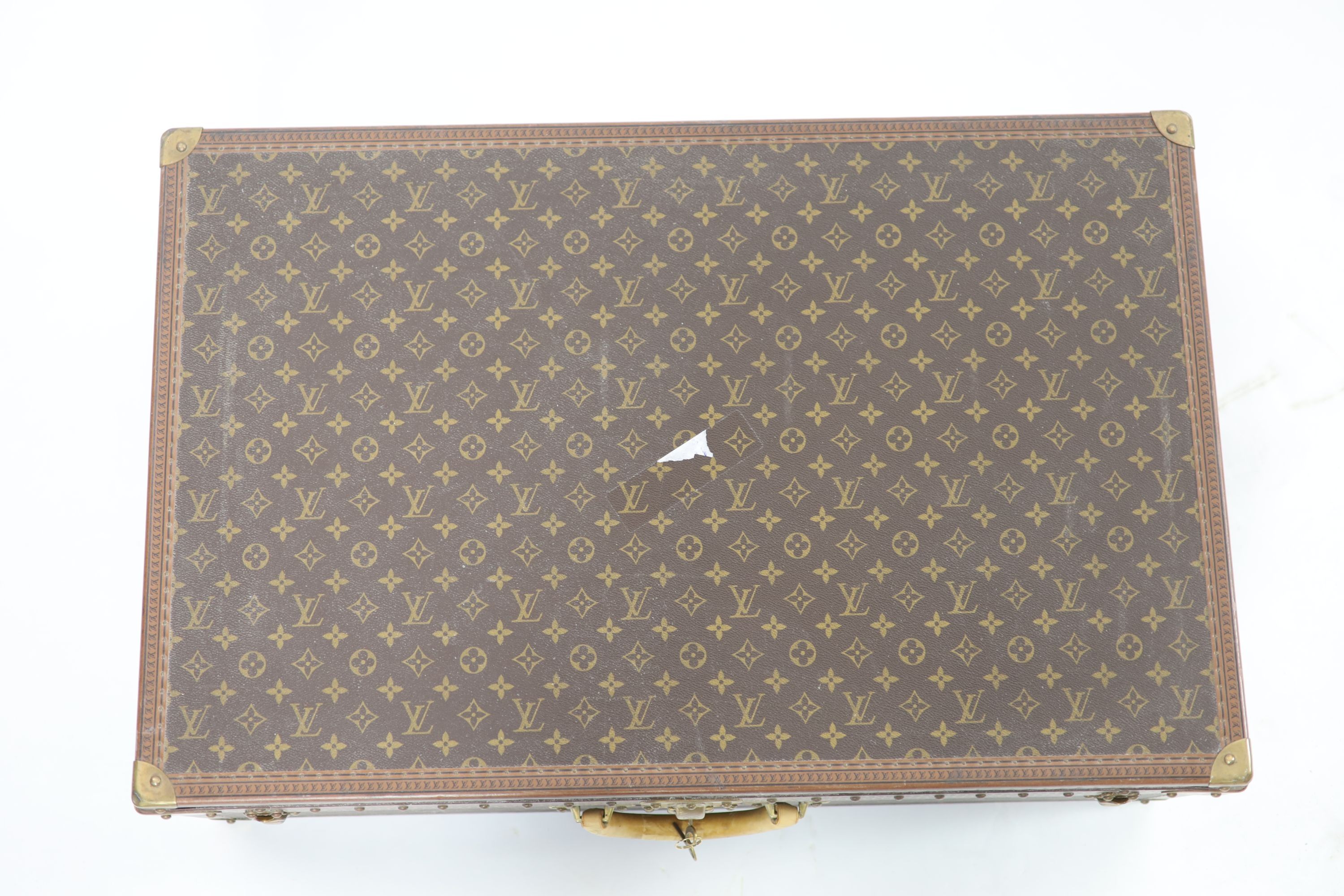 A modern Louis Vuitton Alzer 80 suitcase trunk, 80.5cm wide